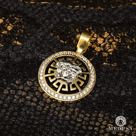 Pendentif médaille Héra motifs Versace et oeil avec cubics en or 